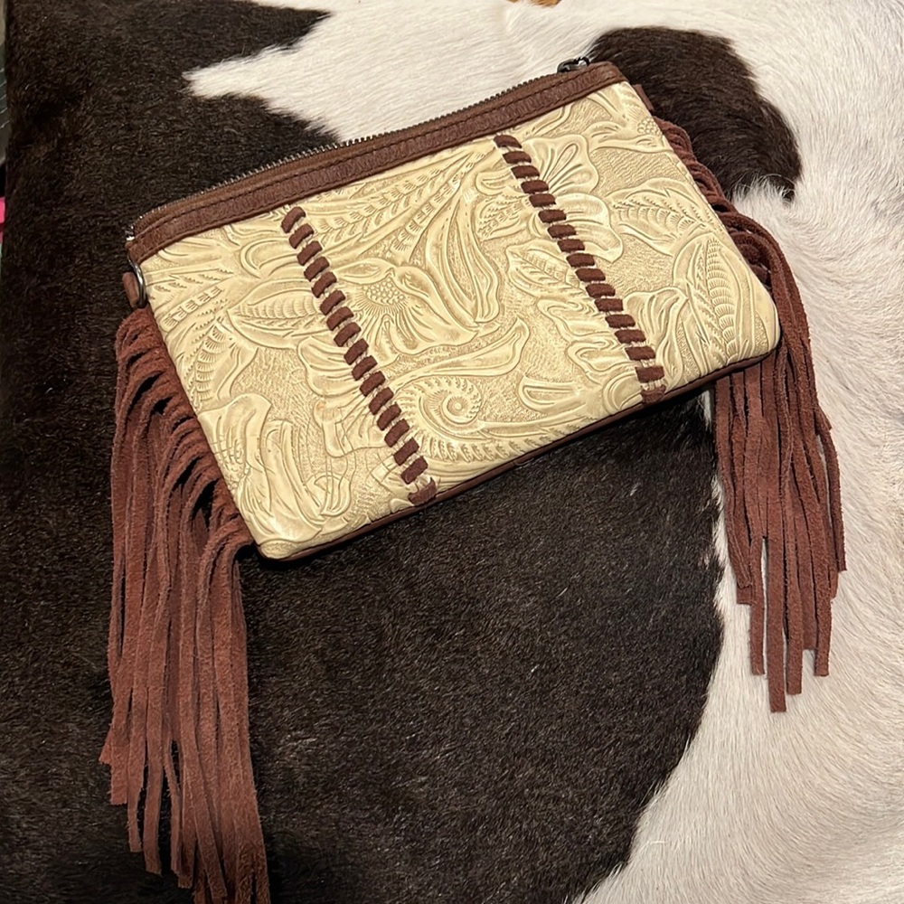 Tooled leather side fringe crossbody. Brand new without tags.